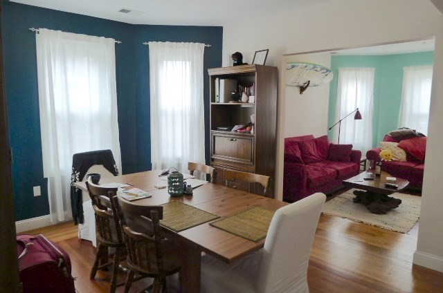 a view of a dining room with furniture