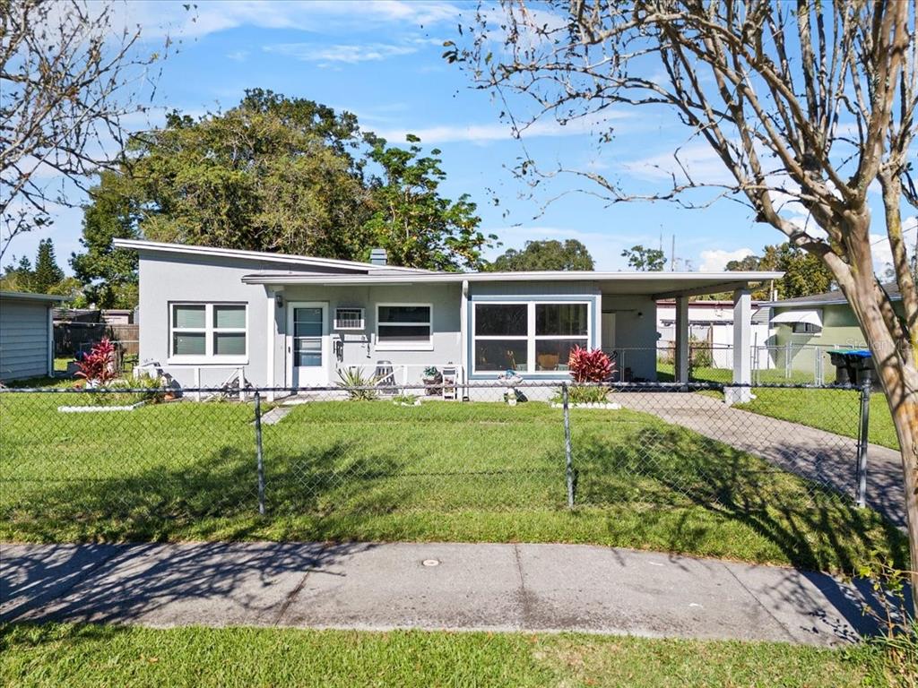 front view of a house with a yard