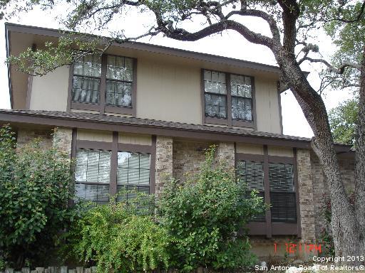 front view of a house with a balcony