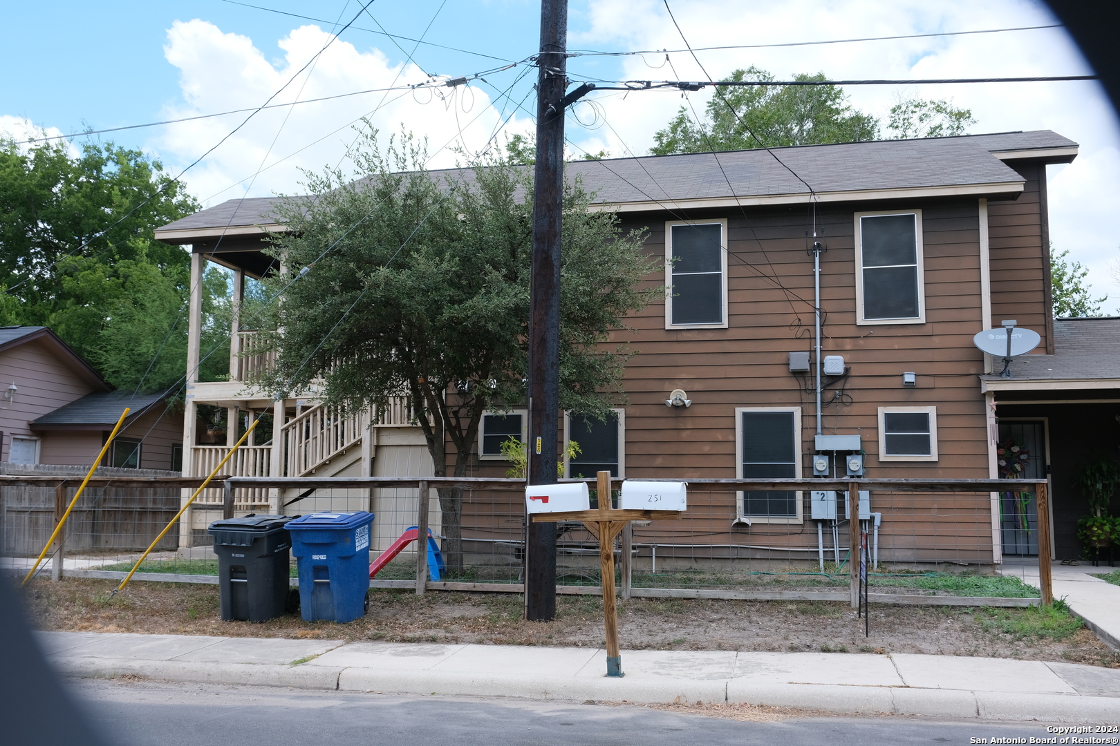 a view of house with outdoor space