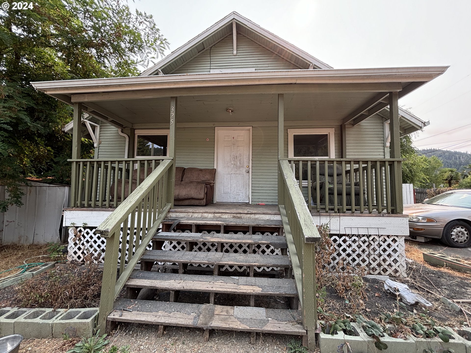 a view of house and front view of a house