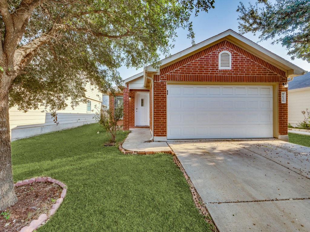 a front view of house with yard