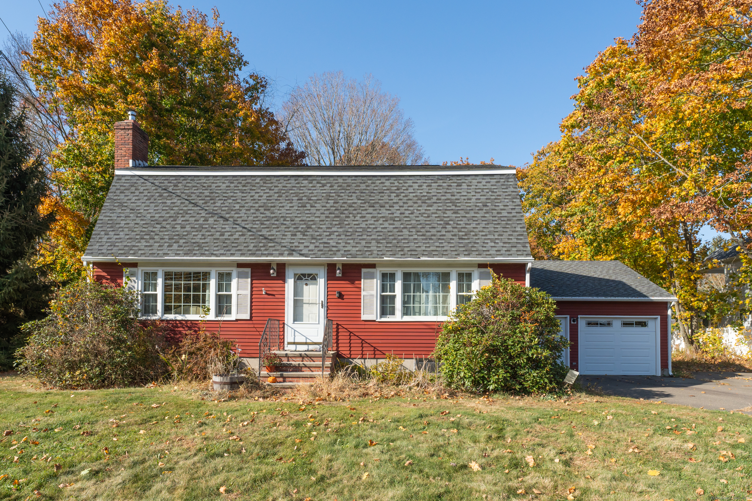 front view of a house with a yard