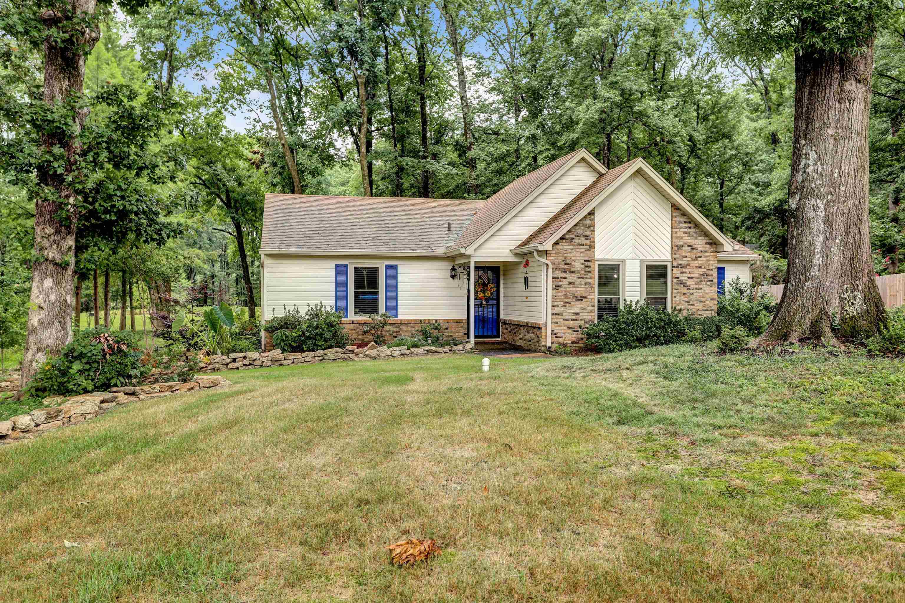 View of front of house with a front lawn