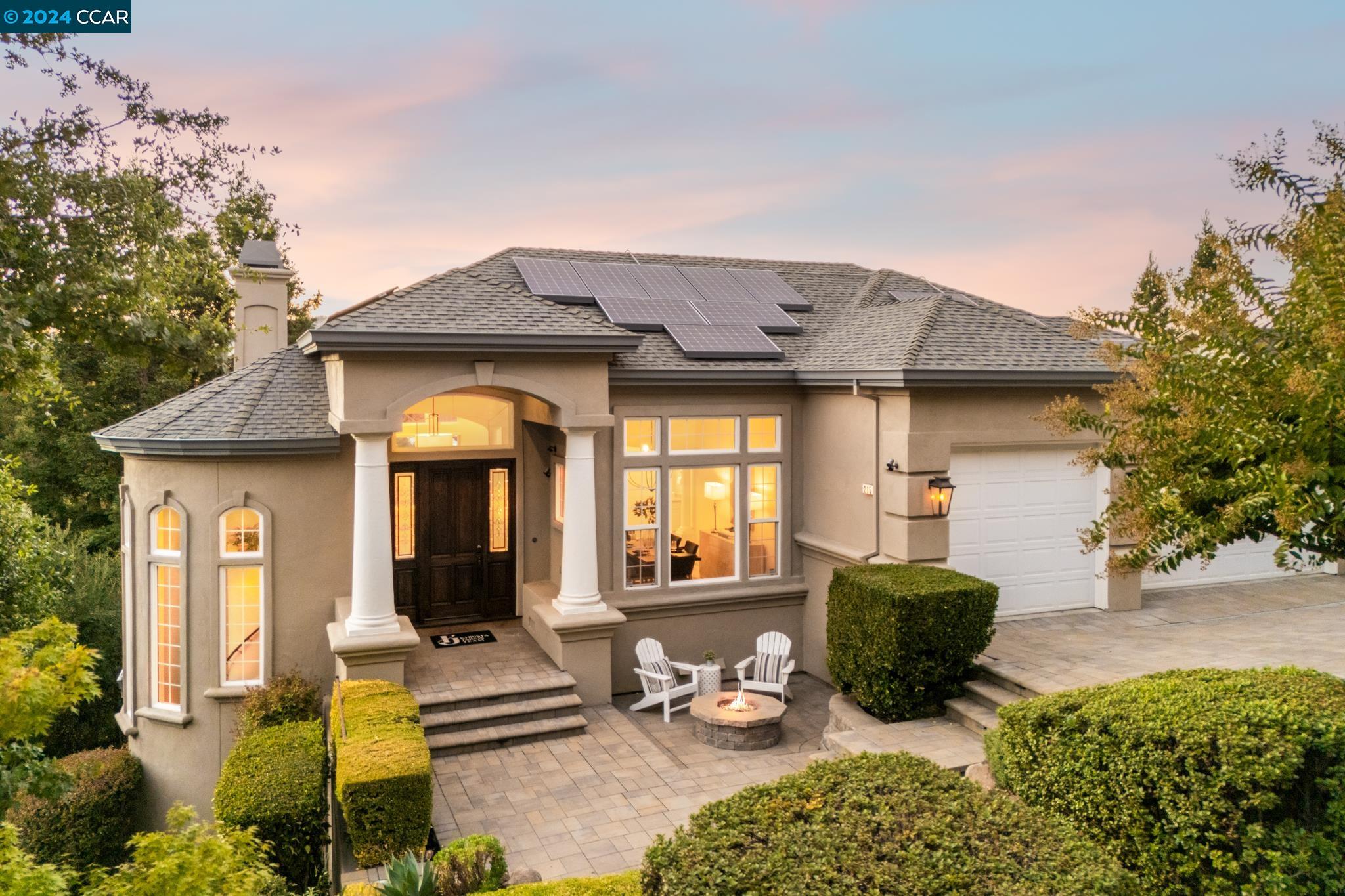 a front view of a house with a porch