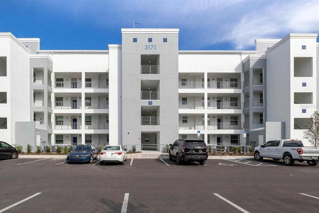 a view of a cars parked in front of a building