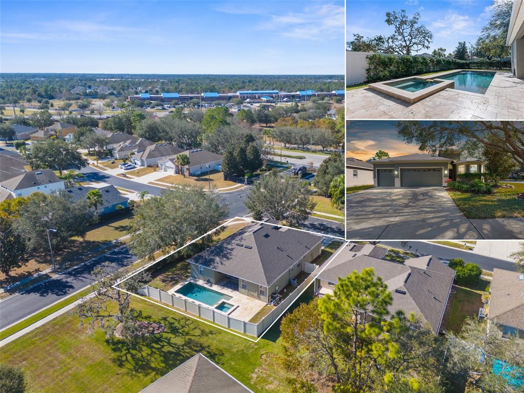 an aerial view of a house with a garden and lake view