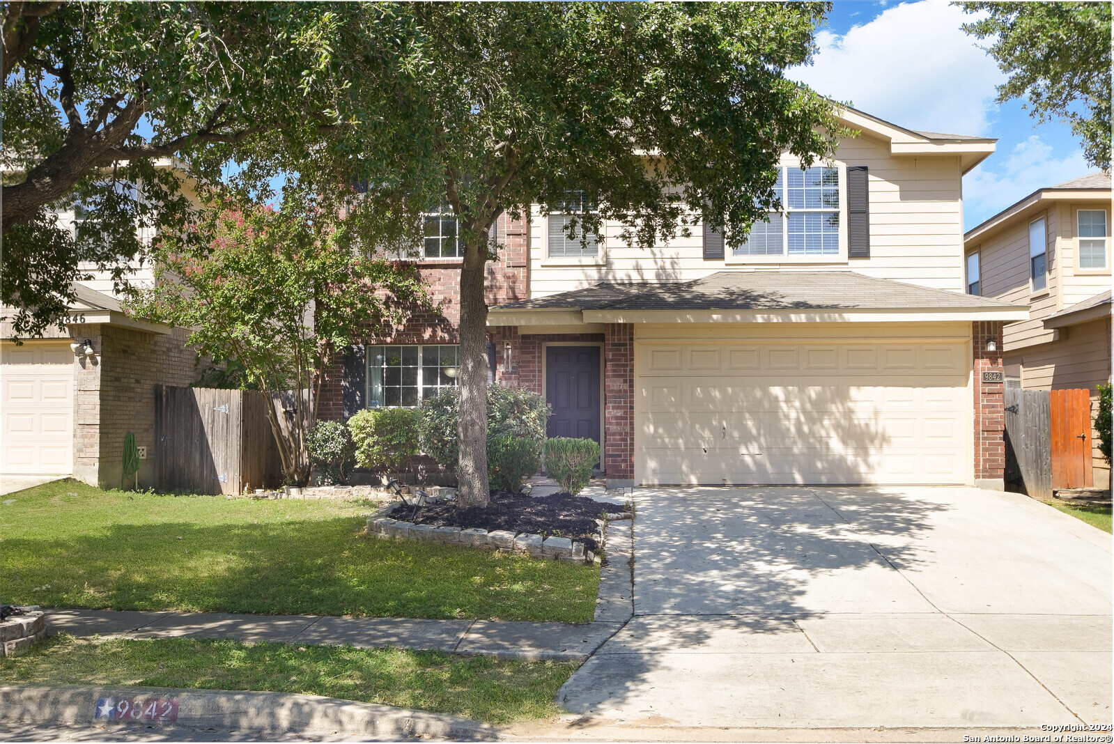 a front view of house with yard