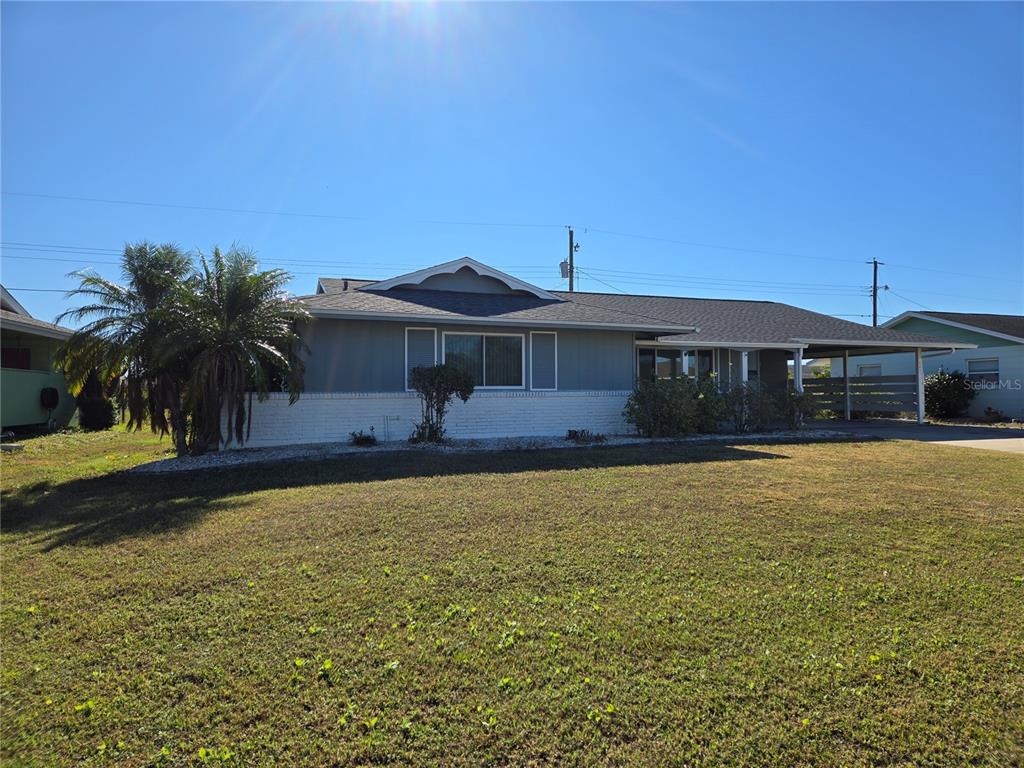 a front view of a house with swimming pool