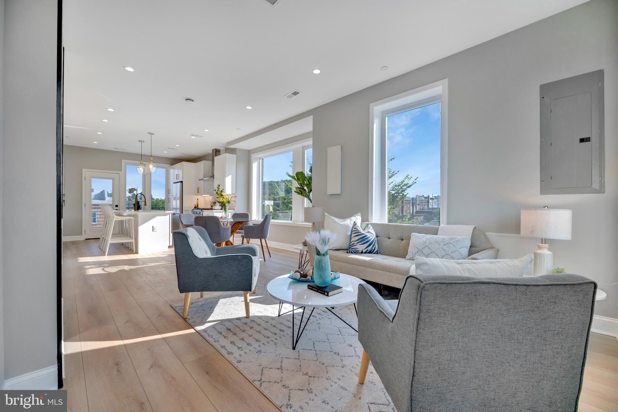 a living room with furniture and a table