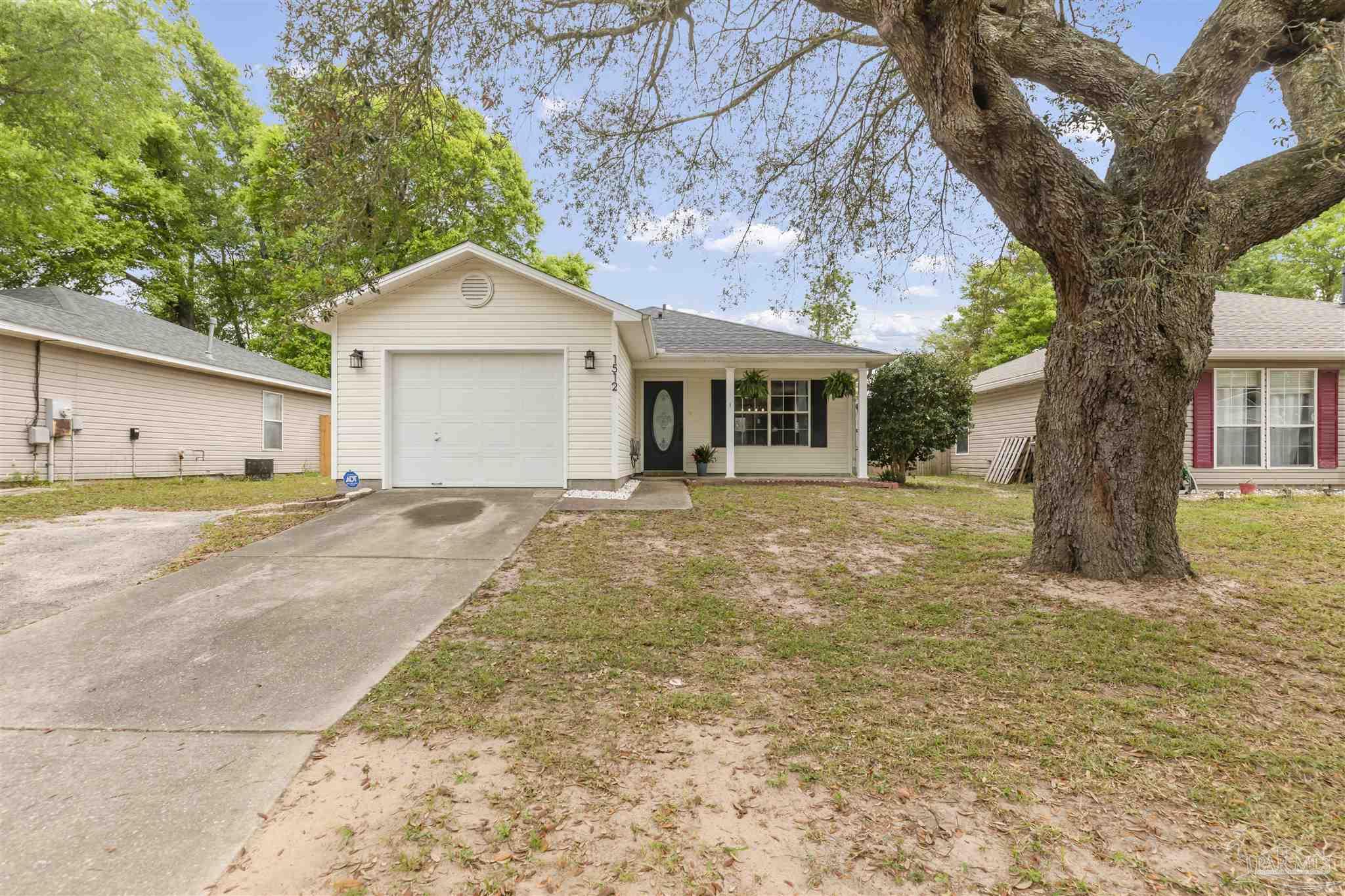 a house with trees in front of it