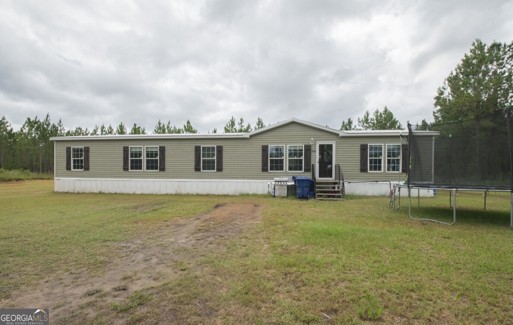 front view of a house with a patio