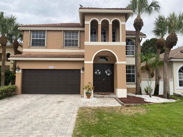 $699,500 | 6931 Spider Lily Lane