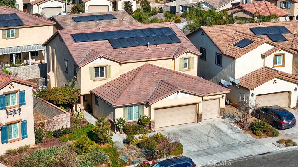 a aerial view of a house with a patio