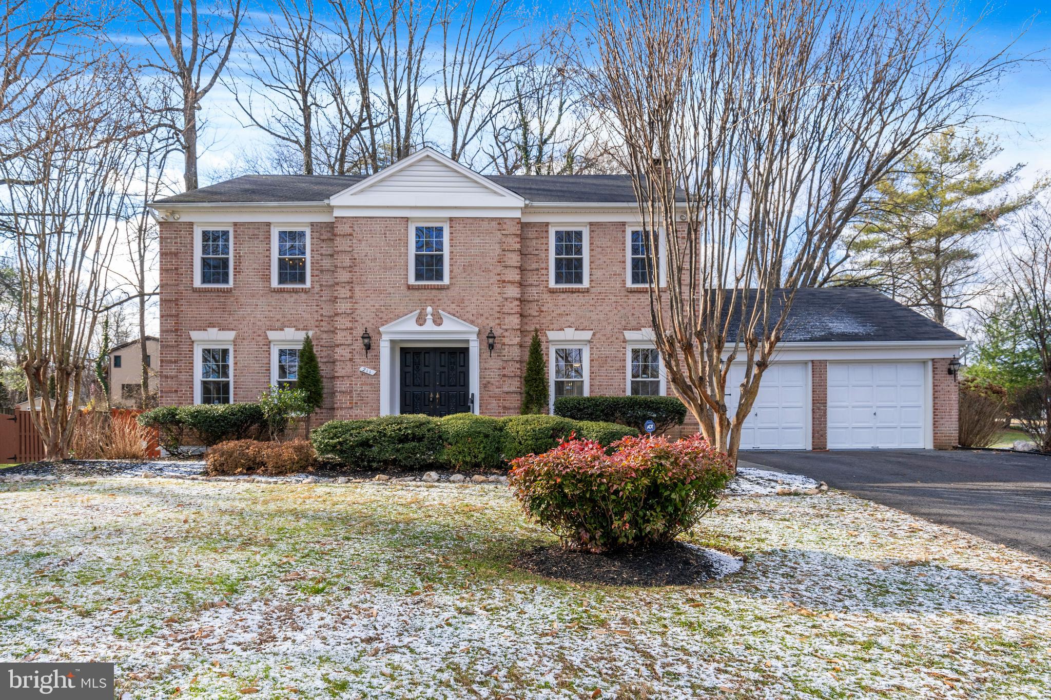 Gorgeous curb appeal w/mature landscaping!