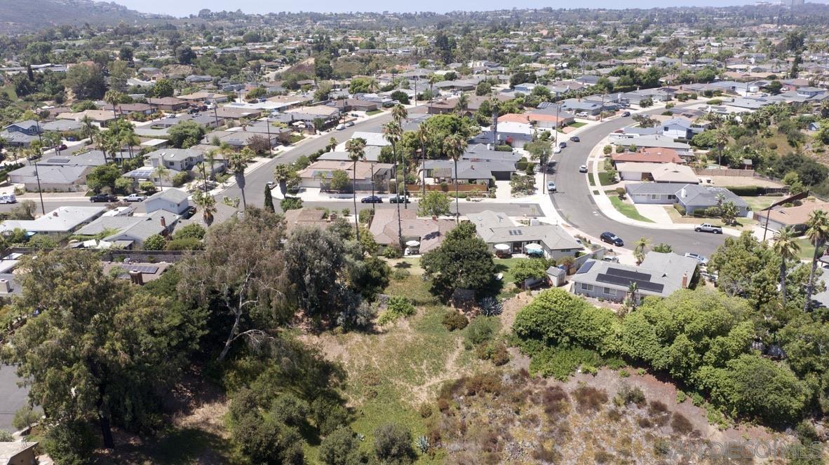 an aerial view of a city with lots of residential buildings