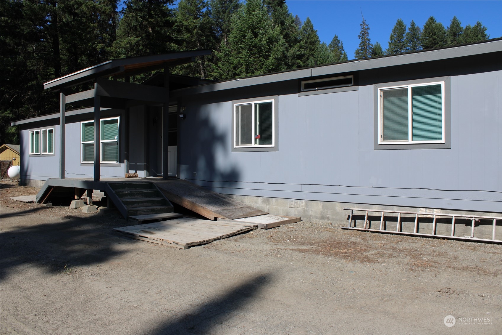 a front view of a house with yard