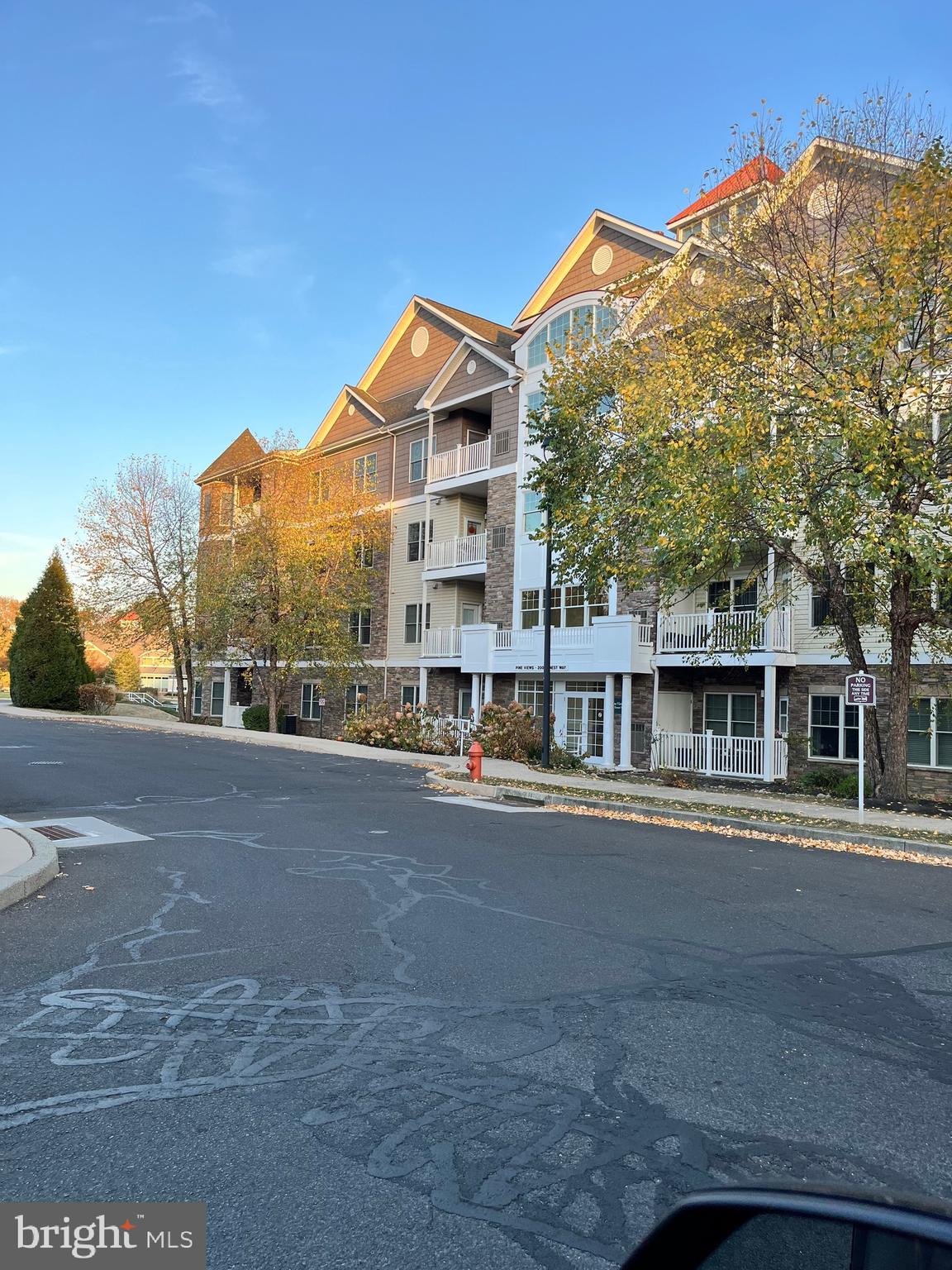 a view of a building with a street