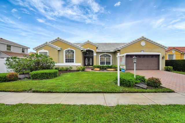 $850,000 | 18570 Serena Pointe Lane | Boca Gardens