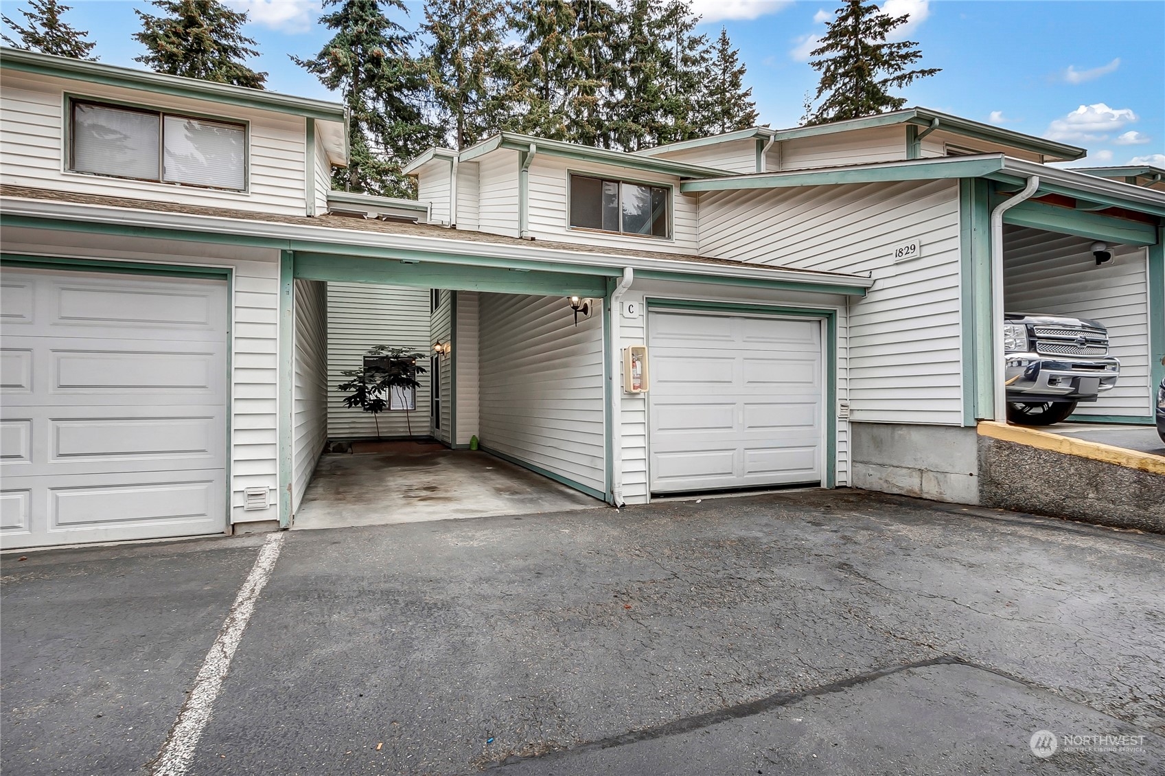 a view of a house with a garage