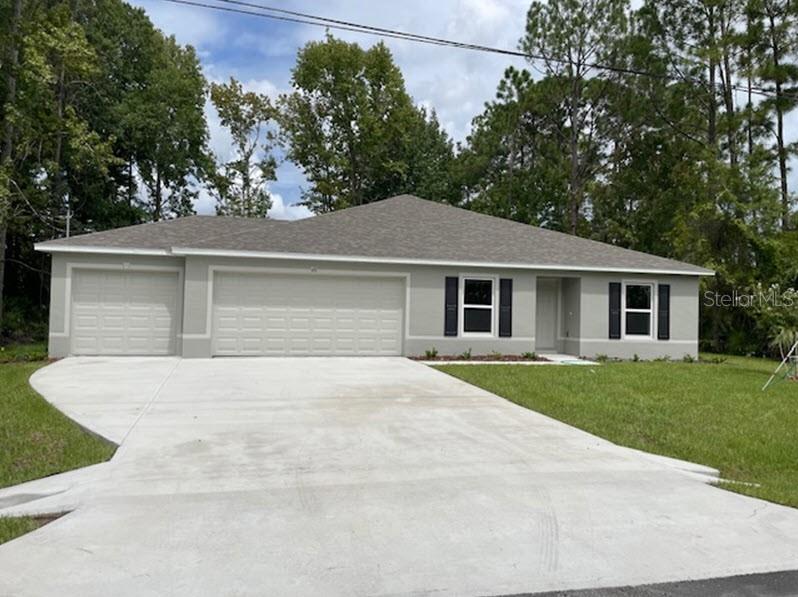 front view of a house and a yard