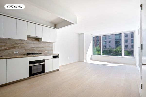 a kitchen with stainless steel appliances granite countertop a stove and a sink