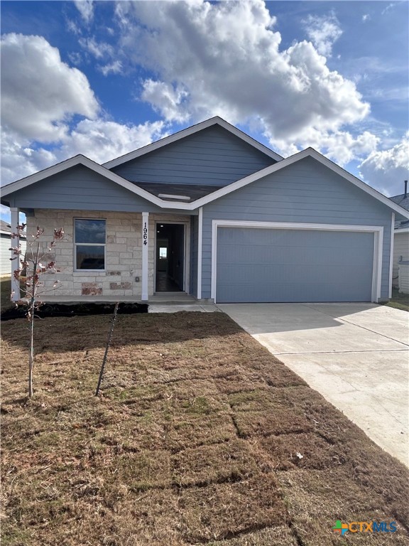 a front view of a house with yard