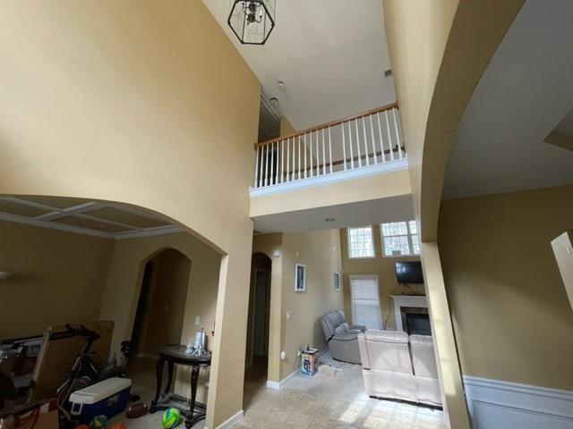 a view of a hallway with entryway wooden floor and front door