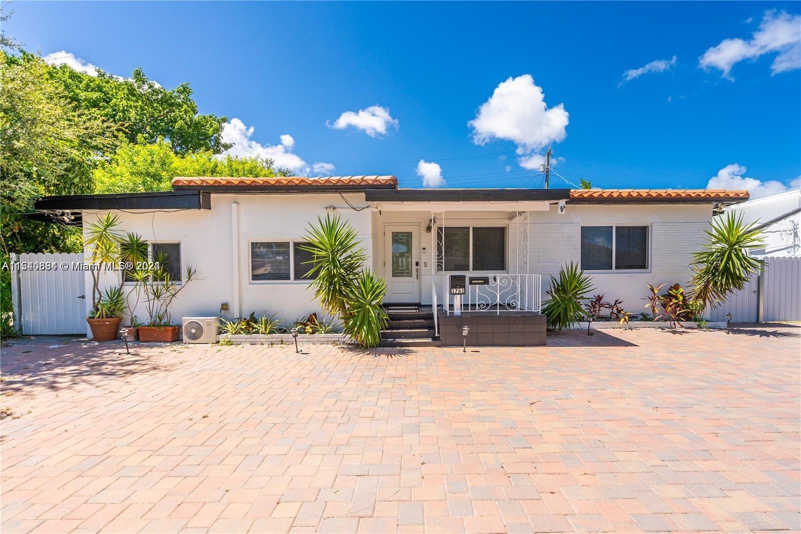 a view of a house with a patio