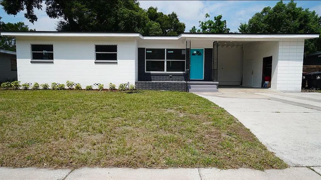 front view of a house with a yard