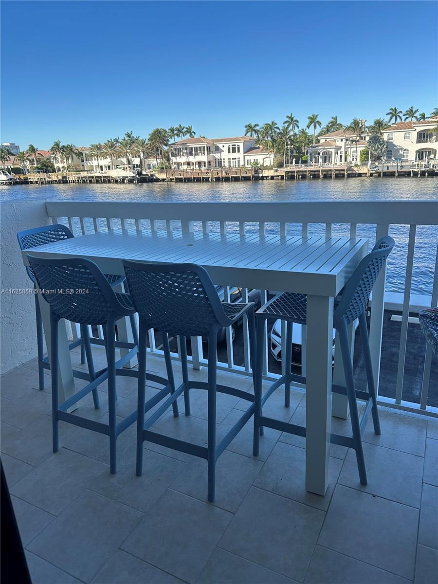 a view of a chairs and table on the terrace