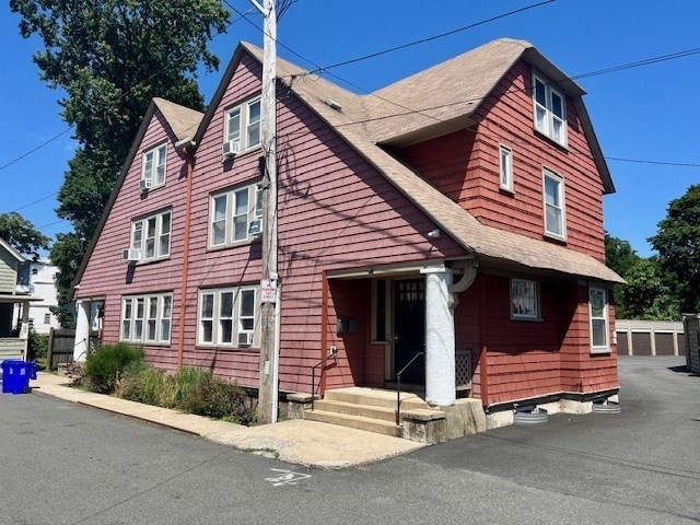 a front view of a house with a garage