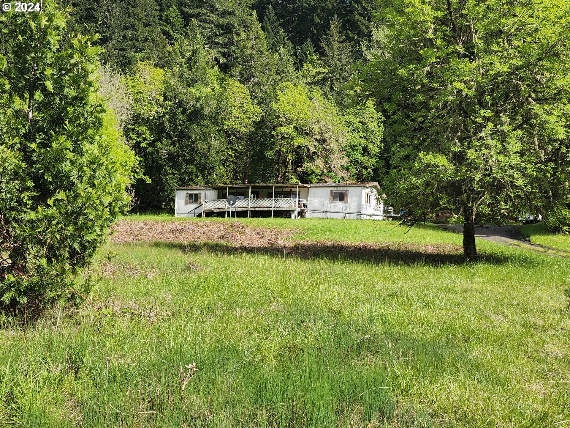 a small pool with a yard