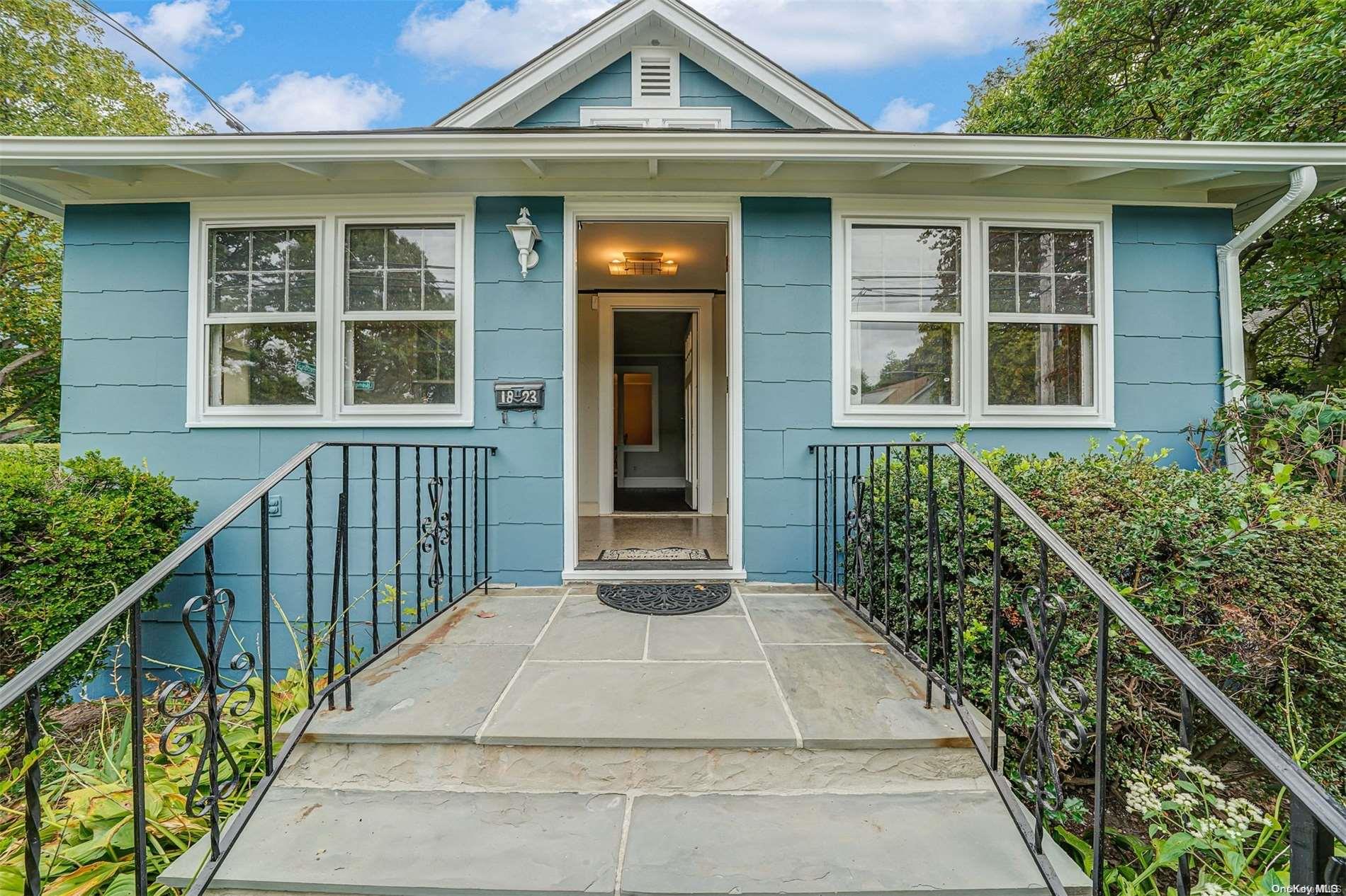 a front view of a house with a porch