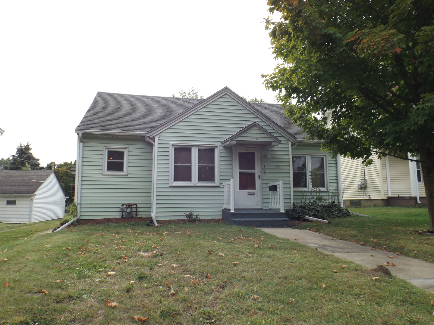 a front view of house with yard