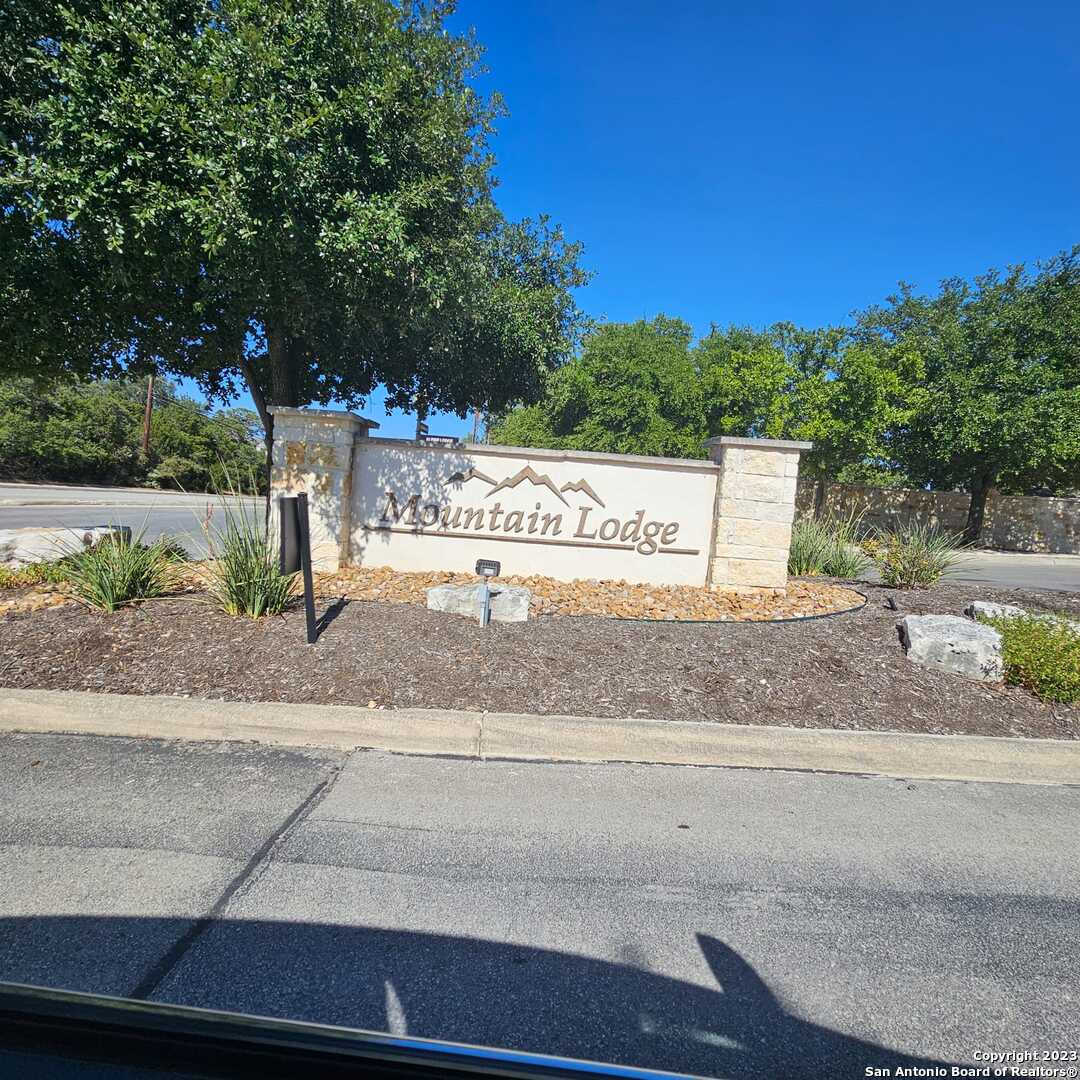 a view of a park with welcome board