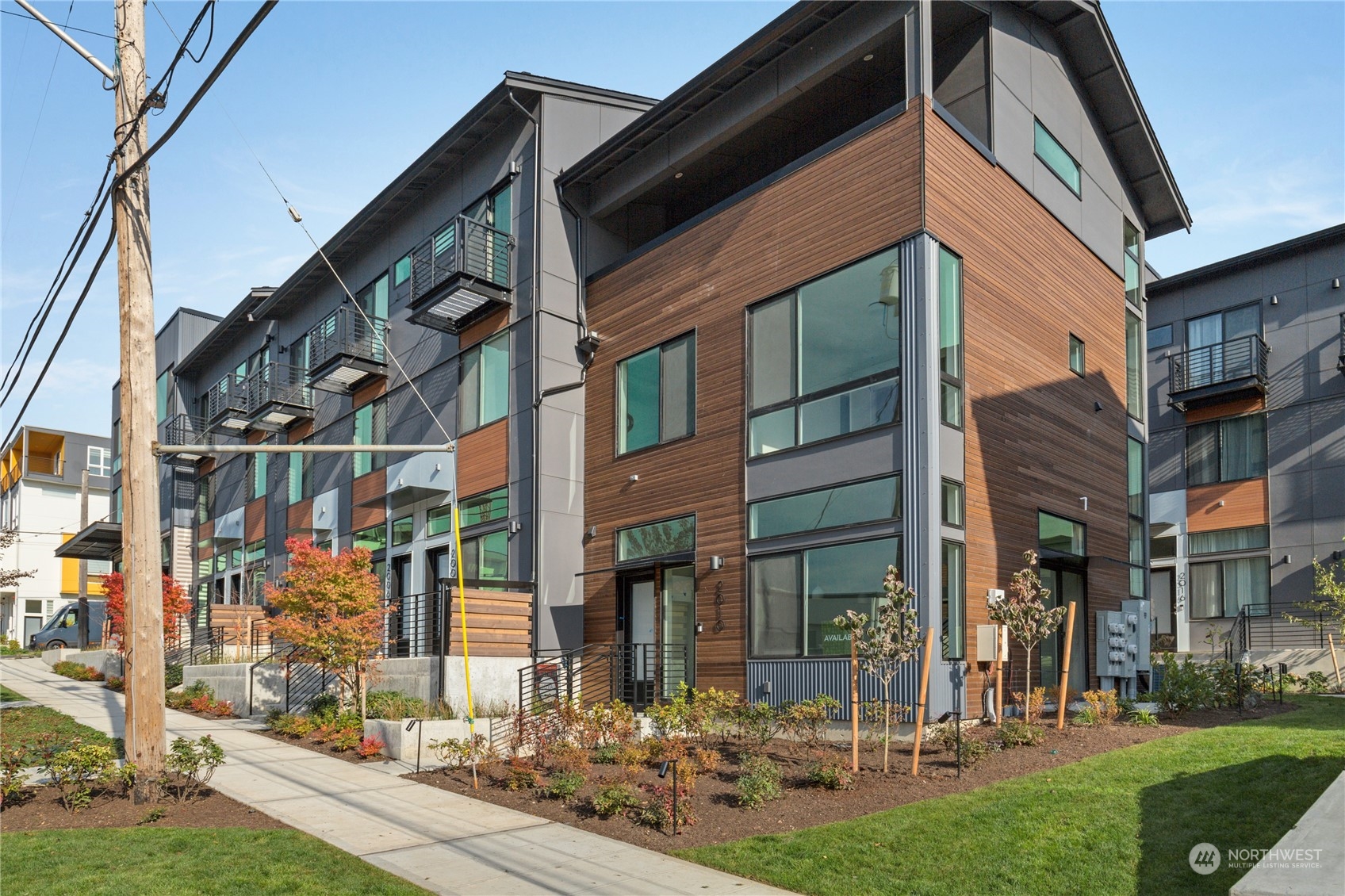 a view of a building with a yard