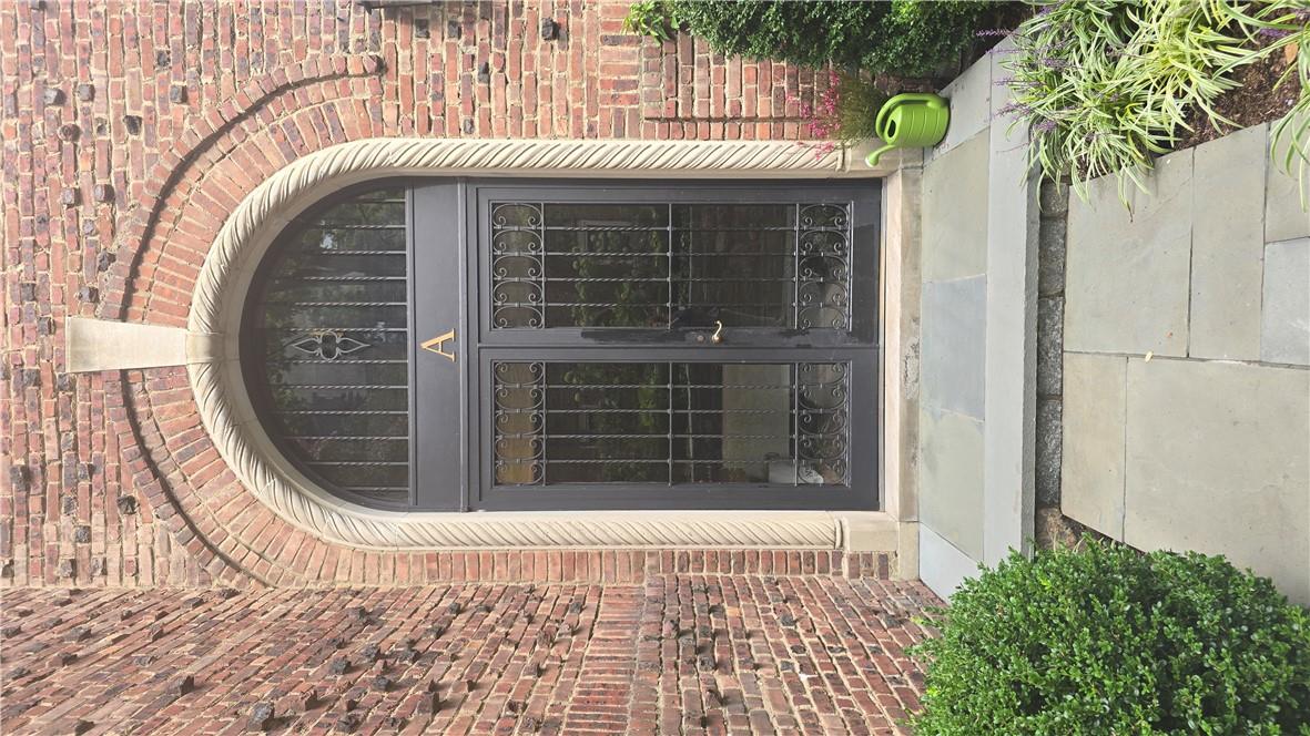 Entrance to property featuring french doors