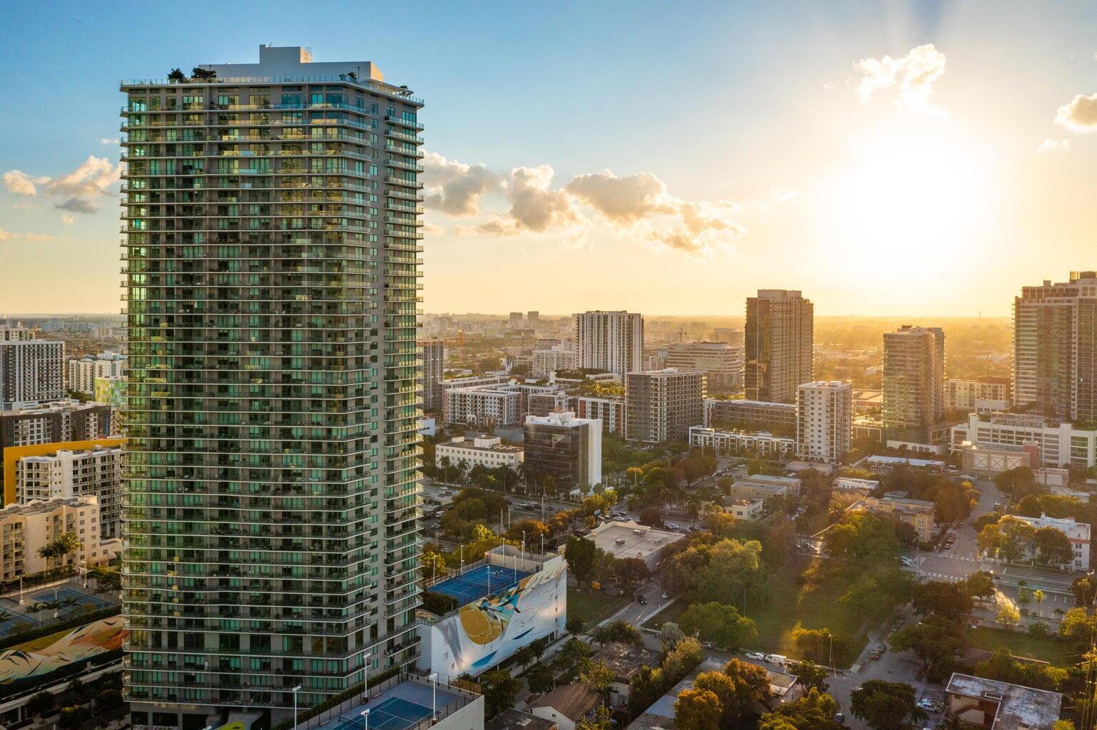 a view of a city with tall buildings