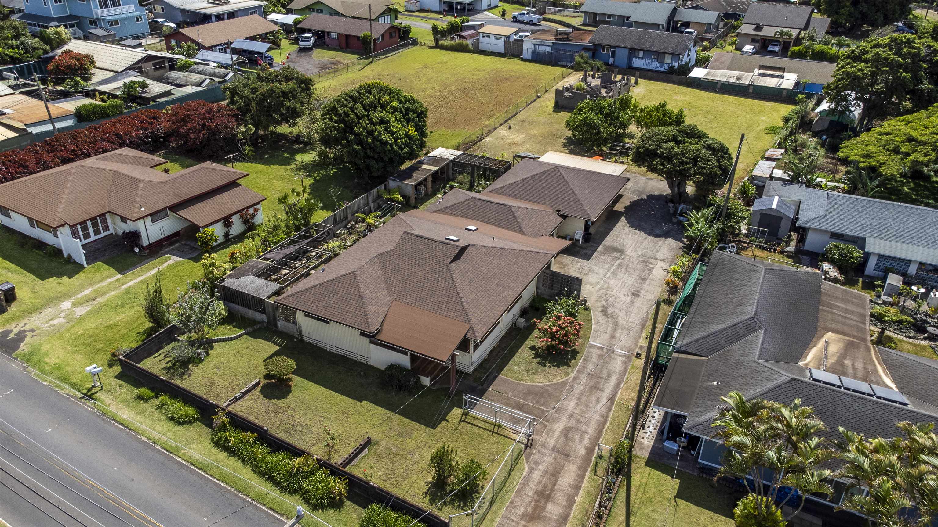 an aerial view of a house with a garden