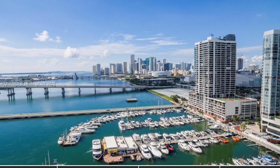 a view of a city with tall buildings