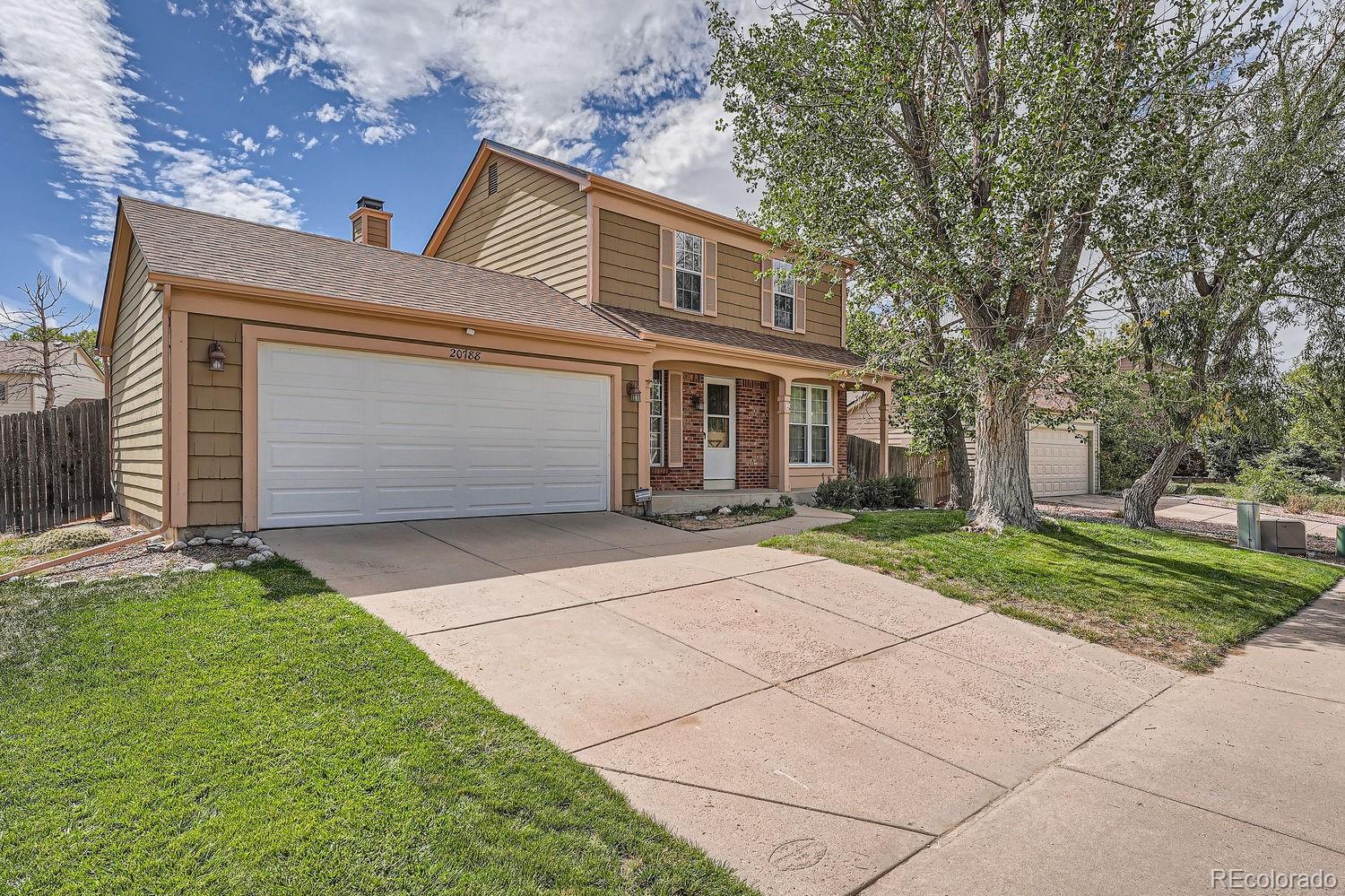 front view of house with a yard