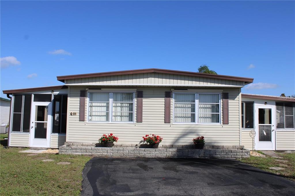 a front view of house with yard