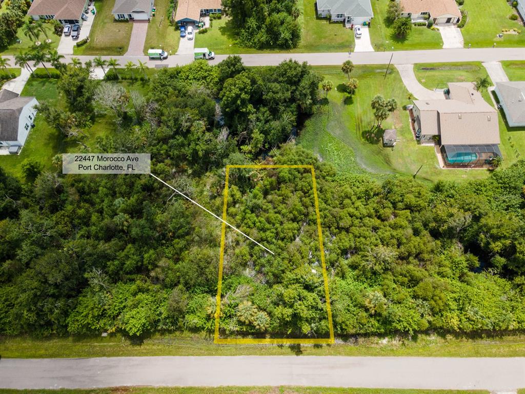 an aerial view of residential house with outdoor space