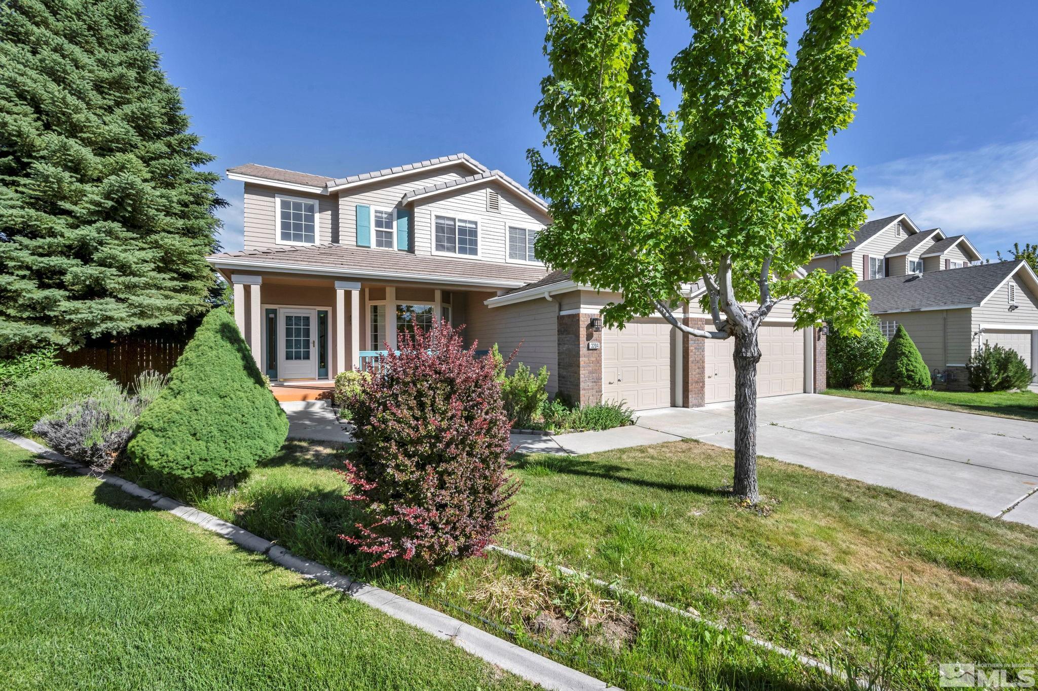 a house view with a garden space