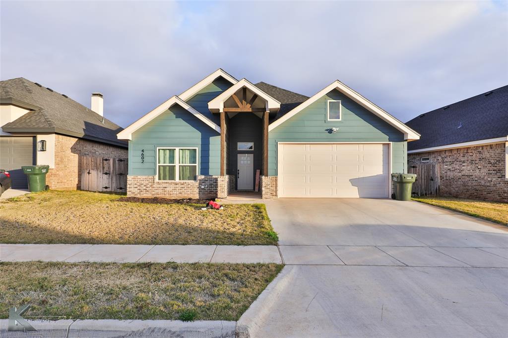 View of front of property with a garage