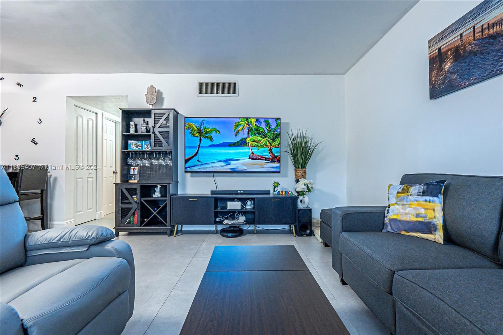 a living room with furniture and a couch