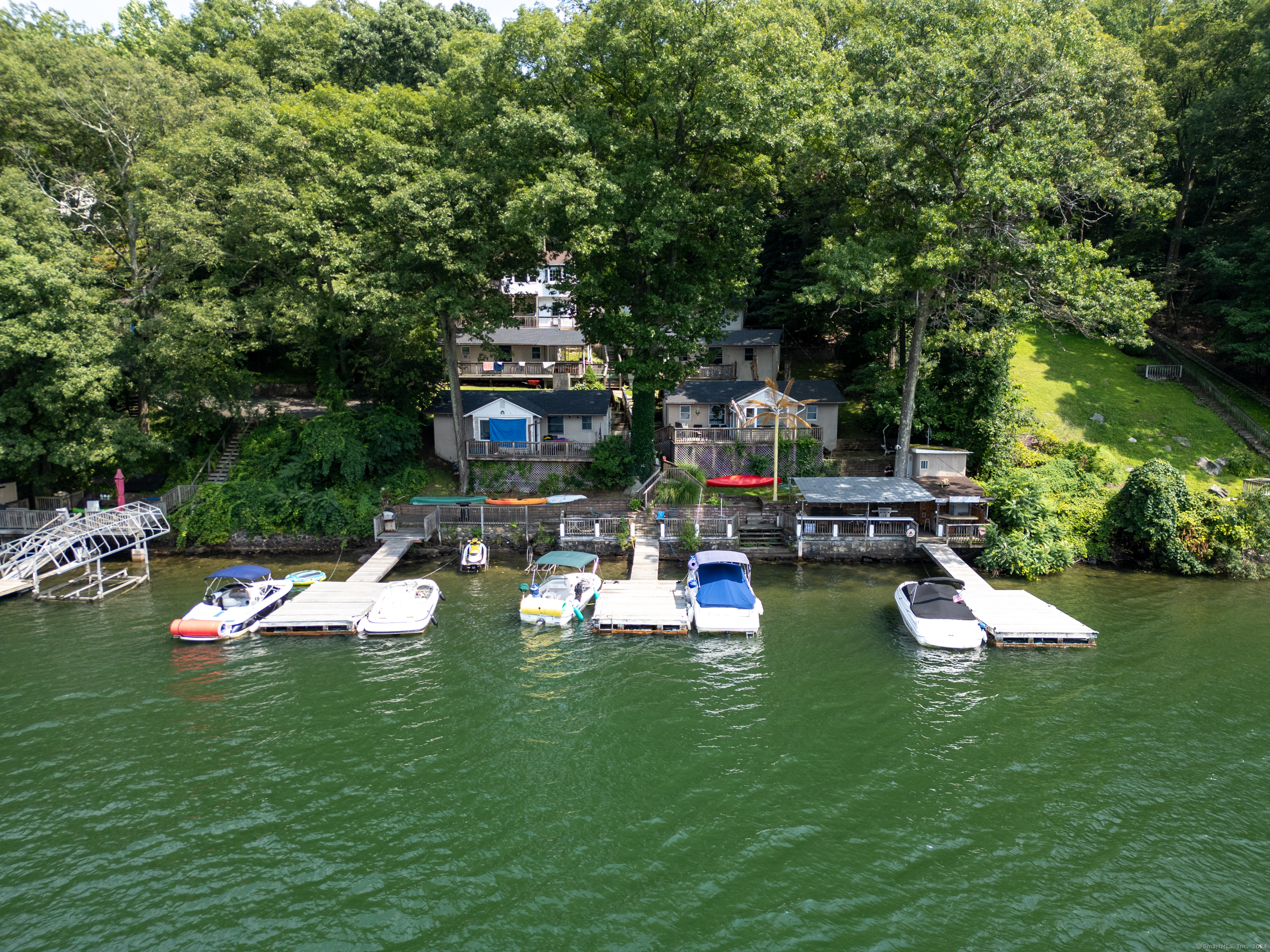 a view of a house with swimming pool and porch