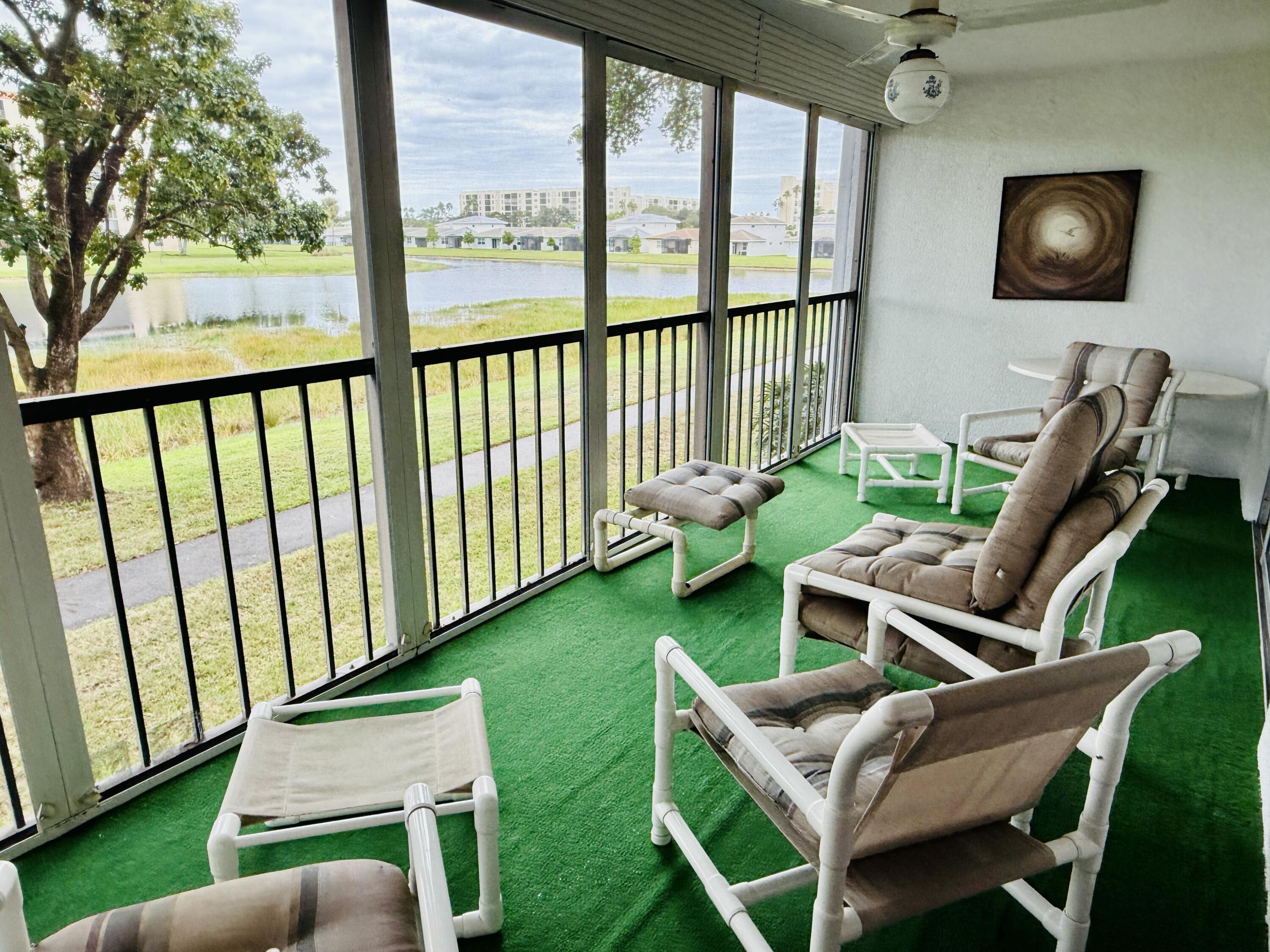 a balcony with chairs