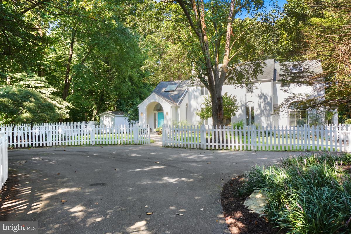 a view of a wrought iron fences in front of house